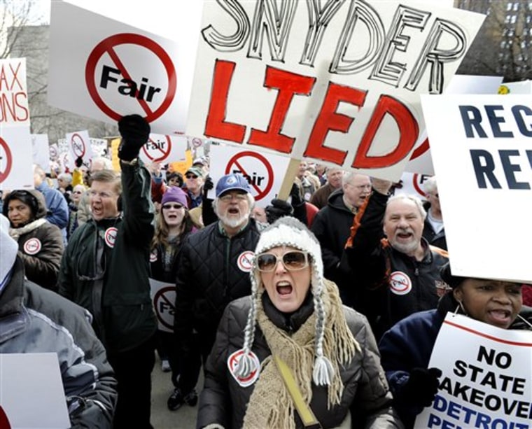 More than a thousand senior citizens and supporters protest Gov. Rick Snyder's proposal to tax pensions during a rally at the Capitol in Lansing, Mich., on Tuesday.